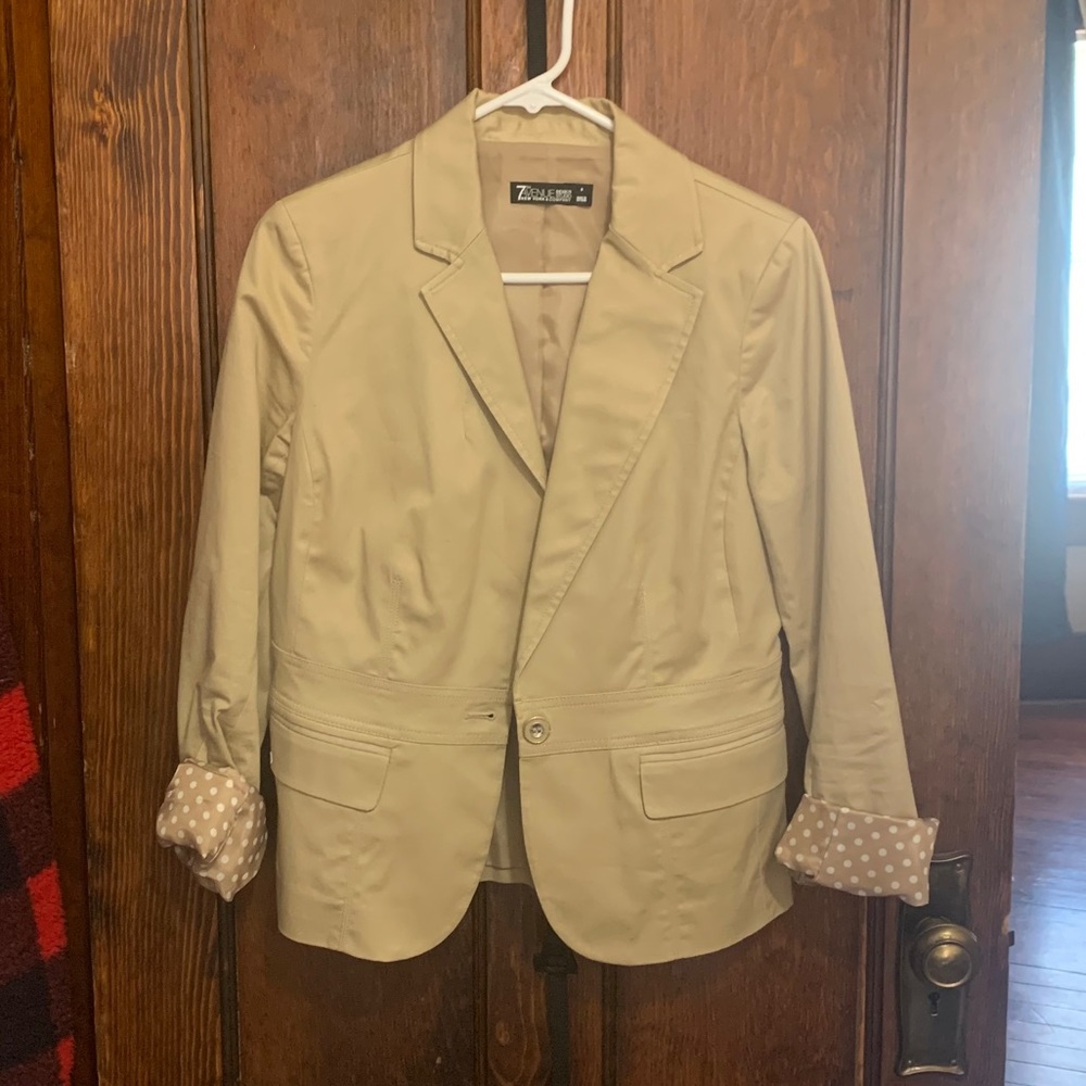 Tan blazer with polka dot accent sleeves